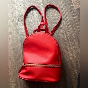 Red back pack purse
